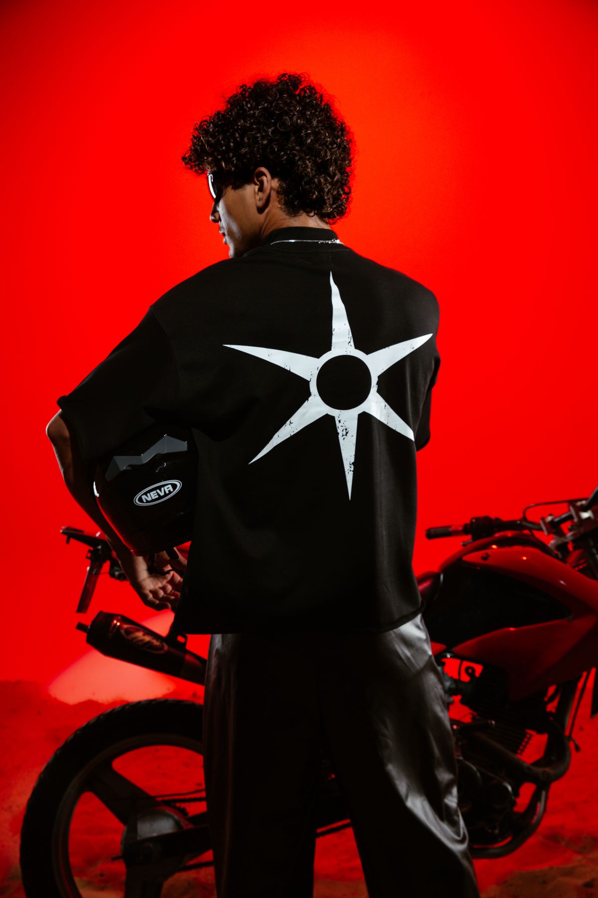 Back of a black shirt with a white star graphic