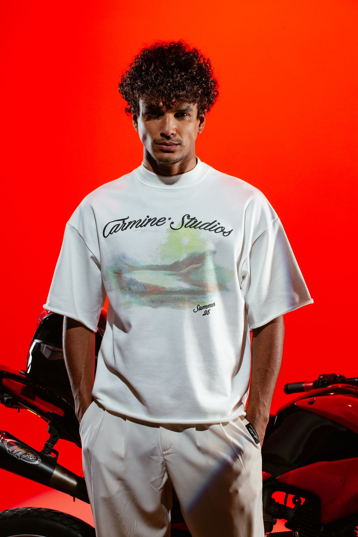 Model in a white Carmine tee